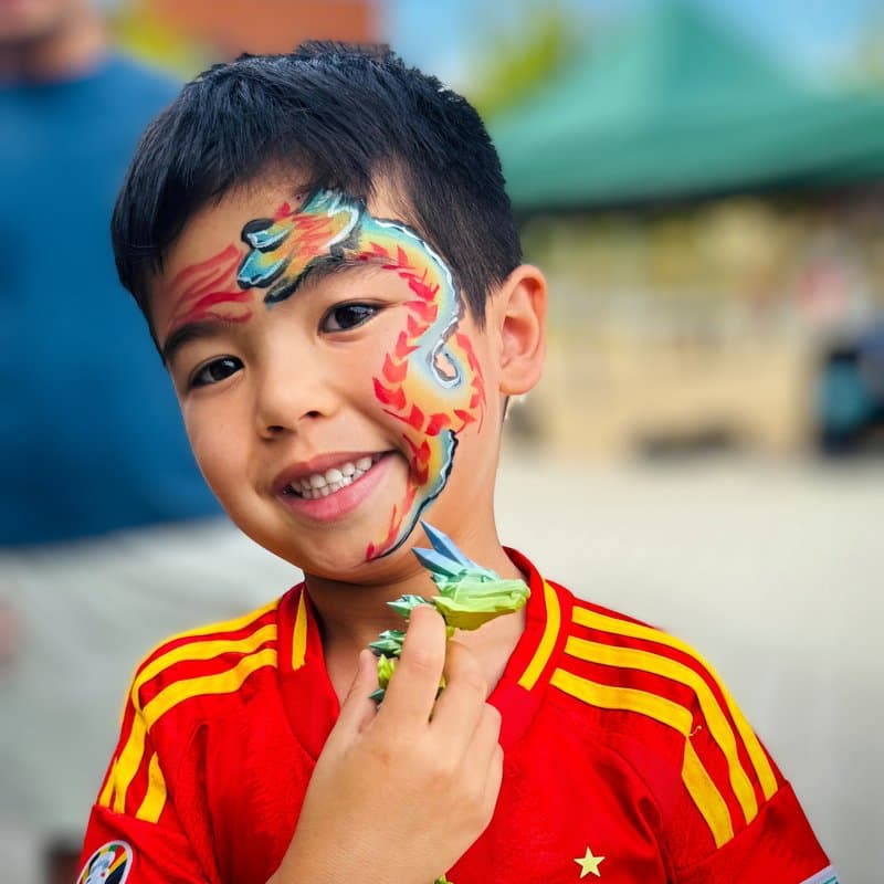 Face painting dragon design