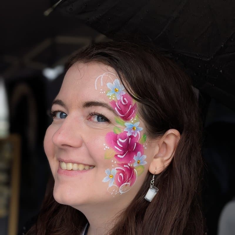 Face painting roses cheek design