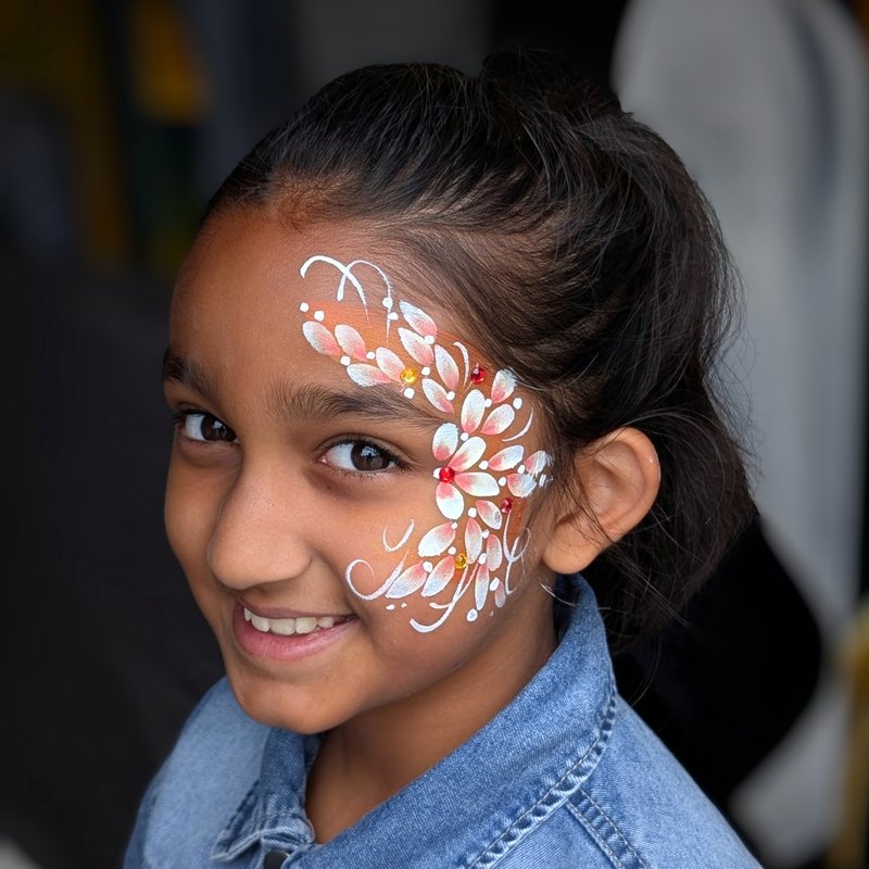 Face painting floral cheek design
