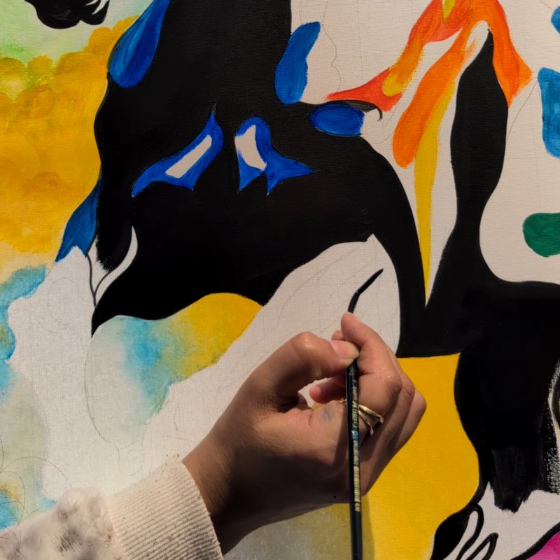 Shilpi painting a vibrant acrylic horse canvas — work in progress